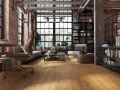 Nowoczesne mieszkanie w stylu industrialnym z ceglanymi ścianami, metalowymi elementami i widokiem na miasto.