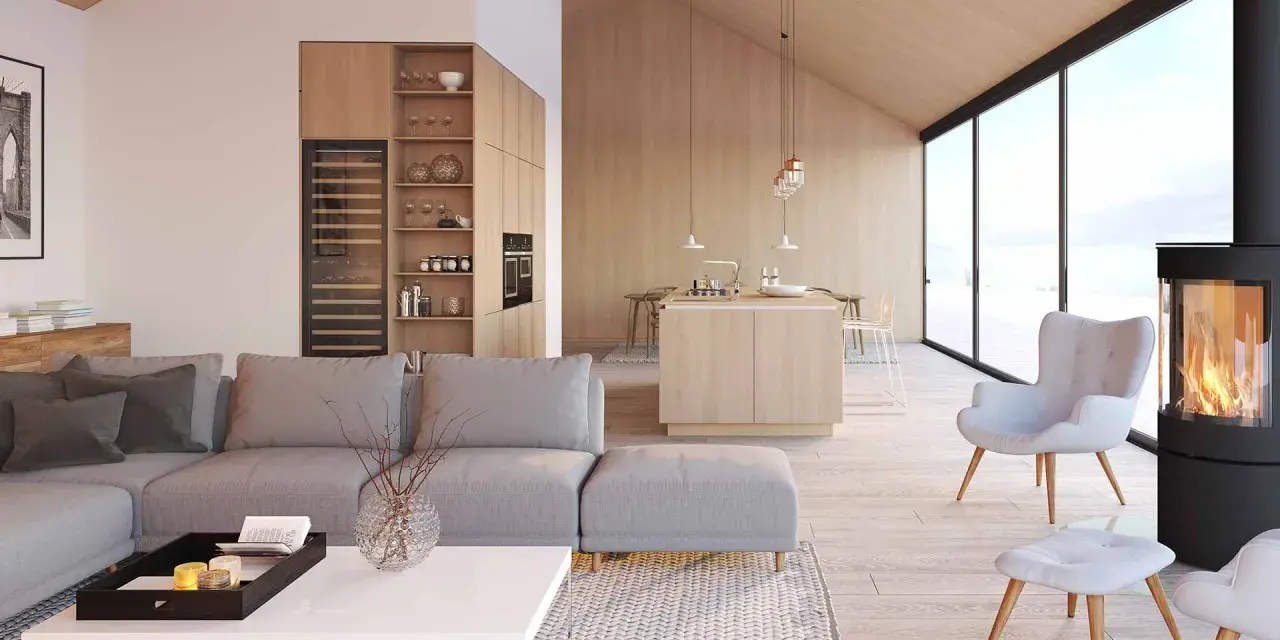 Jasny, przestronny salon z aneksem kuchennym w stylu skandynawskim. Drewniane wykończenia, duża sofa i kominek tworzą przytulną atmosferę.